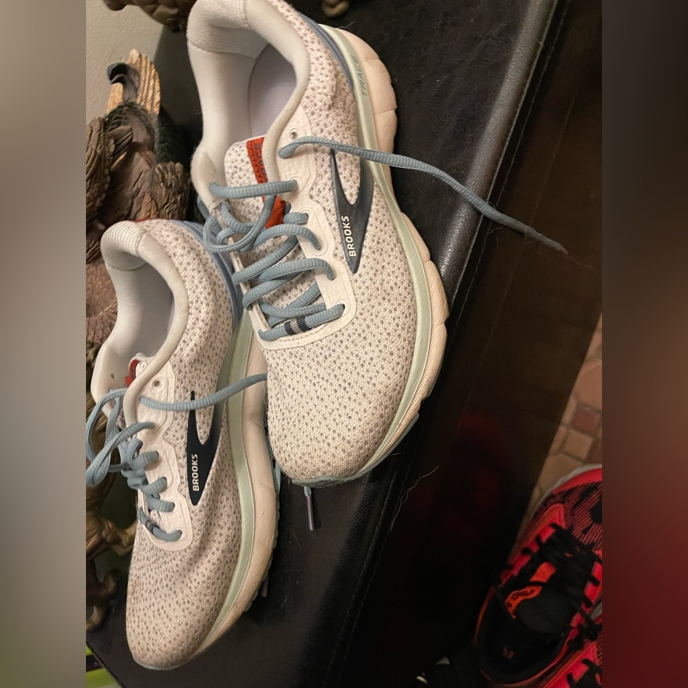 White, grey, blue, and copper 
size 8.5